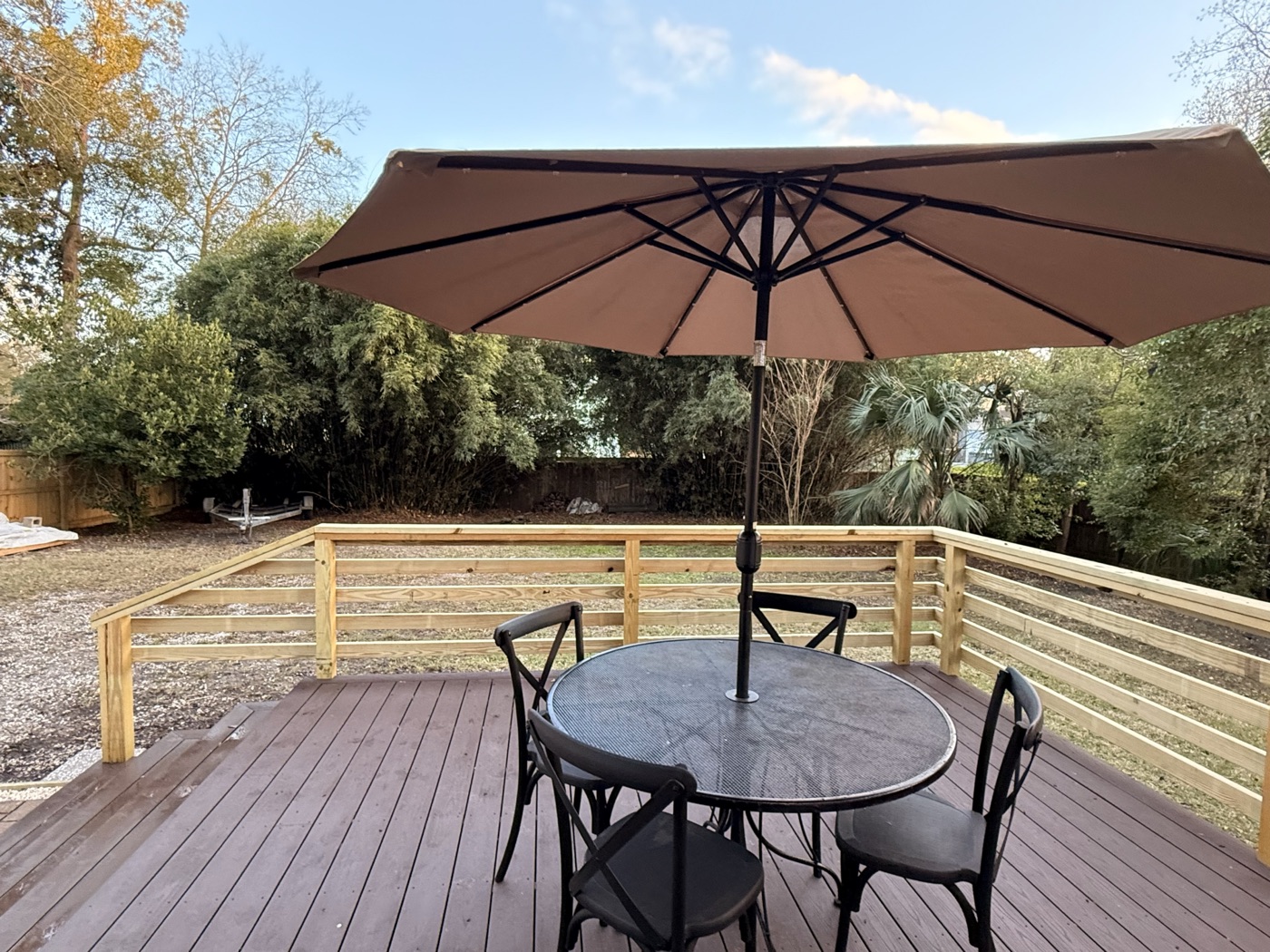 Back deck with umbrella dining set