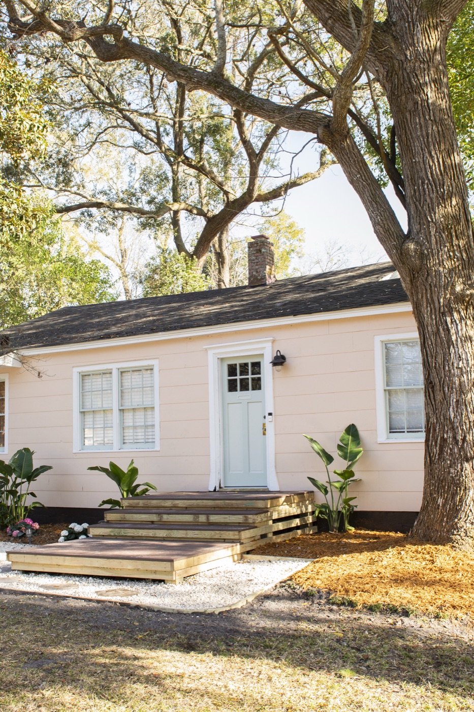 The Beach Peach's seafoam front door and new wooden steps